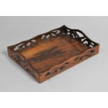 A Small Rosewood Tray with Fretcut Sides, 29cms by 21cms