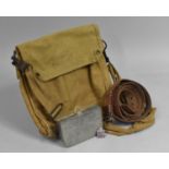 A 1941 Canvas Pouch, Badge, Sandwich Tin and Leather Belt