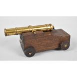 A Miniature Brass and Wooden Model of a Cannon from HMS Victory, 10cms Long