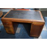 An Edwardian Mahogany Kneehole Desk with Rexine Writing Surface, 128cm wide