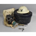 A Vintage Circular Overnight Case Containing Gas Mask, ARP Whistle, ARP Helmet etc