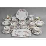 A Royal Albert Lavender Rose Tea Set to comprise Teacups, Saucers, Side Plates, Milk Jug, Sugar Bowl