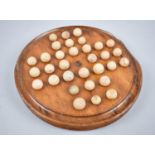 A Late Victorian Circular Solitaire Board with Marbles, 23cms Diameter