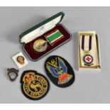 A Cased Women's Voluntary Service Medal Together with an Enamelled Three Year Service British Red