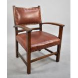 A Mid 20th Century Oak Framed Leather Upholstered Armchair