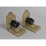 A Pair of Art Deco Onyx Bookends, 11.5cms High