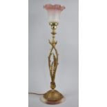 An Impressive Gilt Metal and Onyx Based Table Lamp, Having Foliate Support and Opaque Pink and Plain