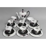 A Royal Albert Masquerade Pattern Coffee Set to comprise Coffee Pot, Saucers, Side Plate, Cans, Milk