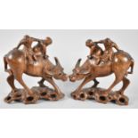 A Pair of Carved Chinese Studies of Water Buffalo with Riders, One with Glass Eye Missing, Each