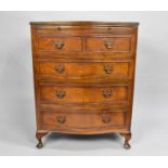 A Mid 20th Century Serpentine Front Walnut Chest of Four Long Drawers with Brushing Slide Over,