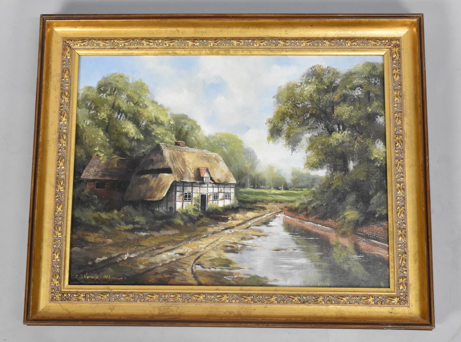 A Gilt Framed Oil on Canvas, Half Timbered Cottage, C.D Howells, 1983. 40x30cms
