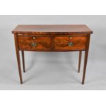 A Mahogany Bow Fronted Side Table with Two Drawers on Tapering Square Supports, 109cms Wide