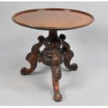 A Victorian Mahogany Circular Table on Carved and Scrolled Tripod Support, 48cms Diameter and