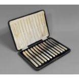 A Cased Set of Twelve Silver Bladed and Mother of Pearl Butter Knives, Sheffield 1923 by Hawksworth,