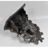 A Vintage Carved Black Forest Wall Sconce/Shelf. 29cms Wide and 34cms High with Stags Head