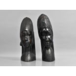 A Near Pair of Carved African Tribal Souvenir Bookends, 28cms High