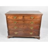 A Mid 19th Century Mahogany Chest of Two Short and Three Long Drawers, Pierced Brass Handles an Ogee