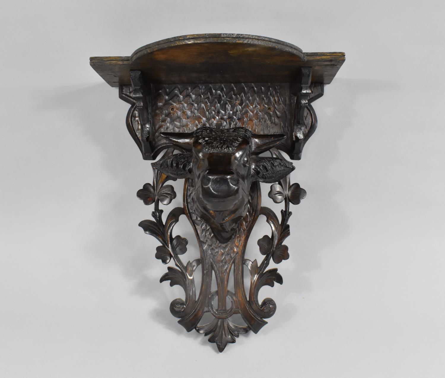 An Early 20th Century Carved Black Forest Wall Shelf with Bulls Head, Pierced Back Plate, 28cms Wide - Image 4 of 4