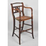 A Late Victorian/Edwardian Cane Seated Childs High Chair