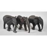 Three Carved Wooden Elephants, All with Mother of Pearl Tusks, tallest 12cms High