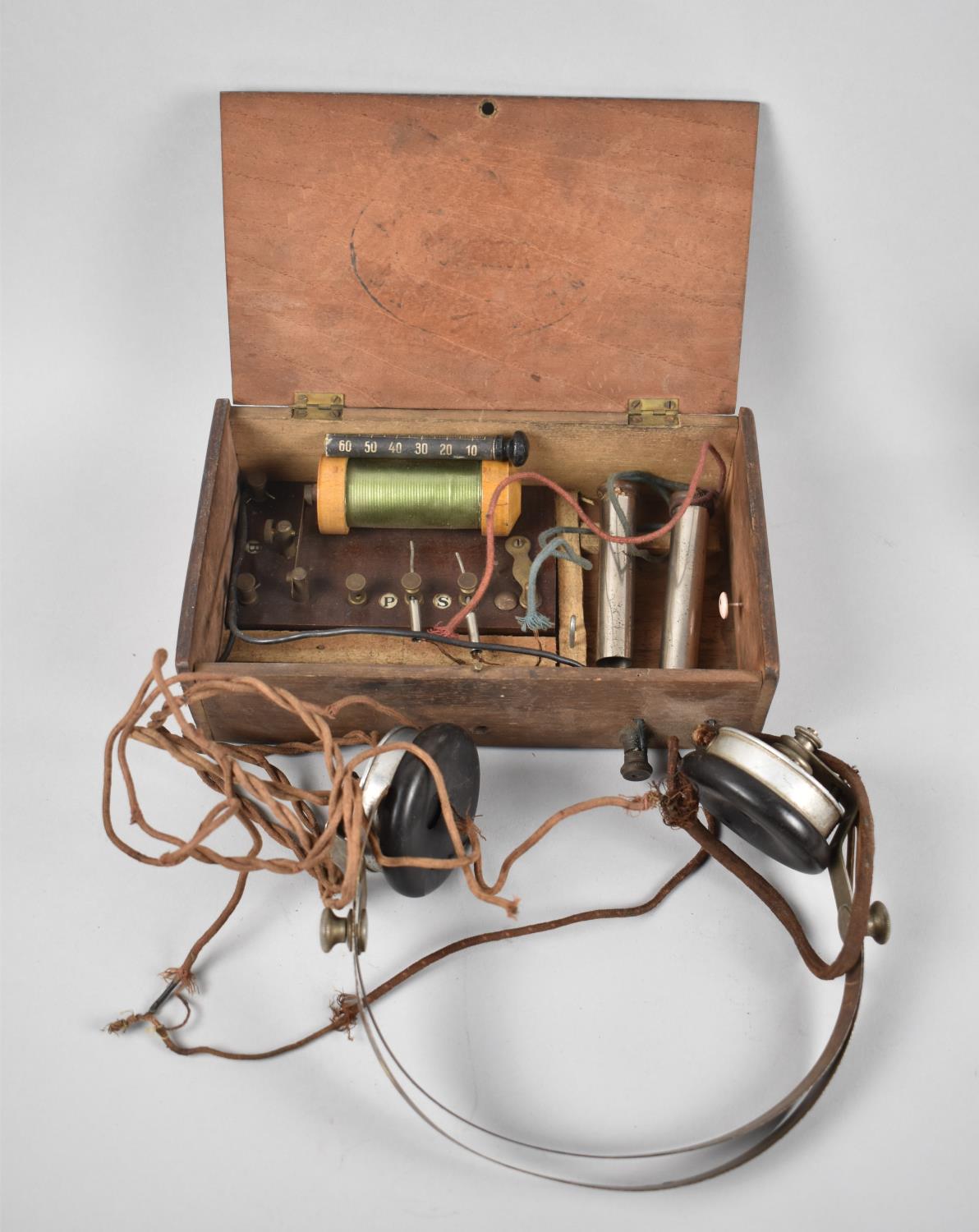 A Hand Made Electric Shock Machine, together with a Pair of Vintage Headphones