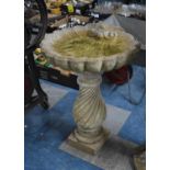 A Reconstituted Stone Bird Bath, of Shell Bowl Form, 79cms High