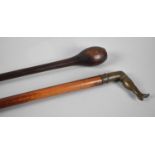 A Victorian Malacca Walking Cane with Novelty Bronze Handle in the Form of a Ladies Stockinged