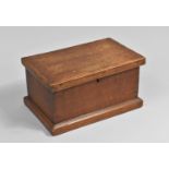 A Small Edwardian Oak Box with hinged Lid, 25cms Wide