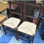 A Pair of Mid 20th Century Rush Seated Side Chairs with Spindle Backs