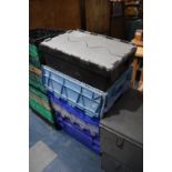 A Collection of Various Plastic Packing Crates with Hinged Lid