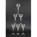 A Set of Six Triple Tapering Knop Stemmed Hock Wine Glasses