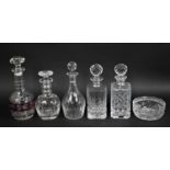 A Collection of Five Glass Decanters Together with a Cut Glass Bowl