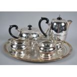 A Four Piece Silver Plated Tea Service on Oval Tray