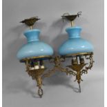 A Pair of Gilt Metal Ceiling Light Fittings with Blue Glass Shades, 45cm high