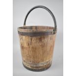 A 19th Century Brass Bound Bucket with Loop Handle, Tapering Form, 31cms Diameter and 31cms High