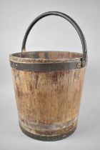 A 19th Century Brass Bound Bucket with Loop Handle, Tapering Form, 31cms Diameter and 31cms High