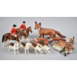 A Large Beswick Fox and Curled Fox Together with Four Beswick Fox Hounds, One with Glued Leg Also