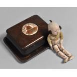 An Meiji Japanese Articulated Doll, 12cm High Together with a Japanese Hardwood Rectangular Box on