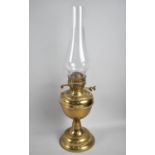 A Brass Oil Lamp with Plain Glass Chimney