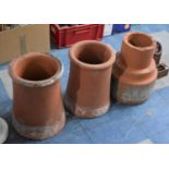 Three Terracotta Chimney Pots, 37cm high
