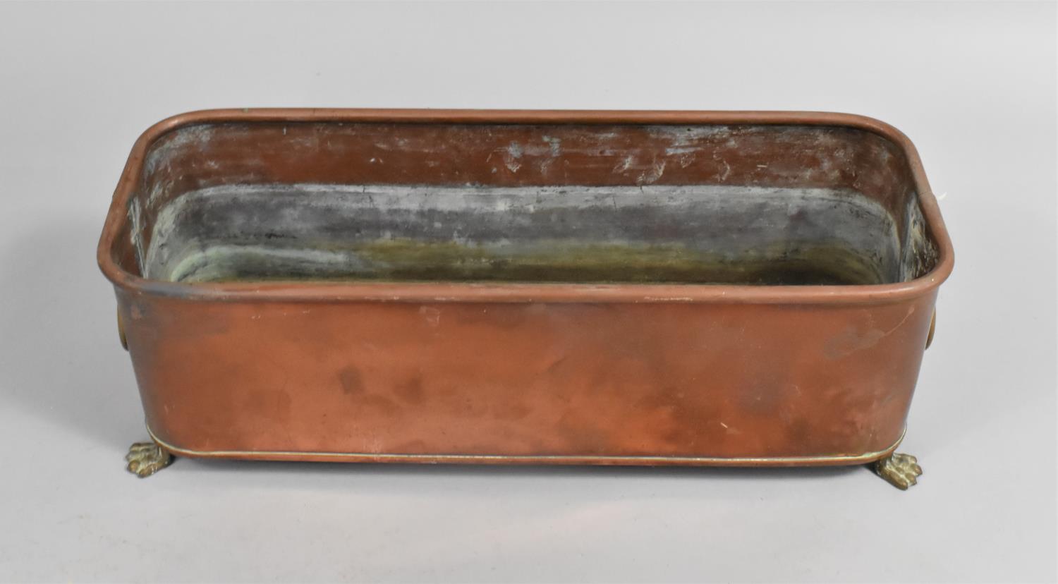 A Rectangular Copper Planter with Brass Claw Feet, Lion Mask Ring Handles, 39cms Wide - Image 2 of 2