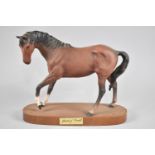 A Beswick Spirit of Youth on Oval Wooden Plinth