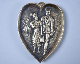 A Novelty WWII Novelty Brass Ashtray in the Form of a Heart, with Dutch Girl and Soldier, 11cms High