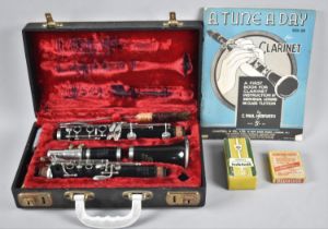 A Cased Clarinet, The Studente Console by Selmer, together with Booklet Etc