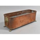 A Rectangular Copper Planter with Brass Claw Feet, Lion Mask Ring Handles, 39cms Wide