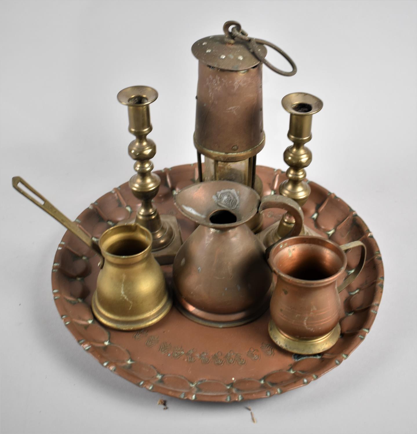 A Collection of Copper and Brass Items to Include Miners Lamp, Measuring Jug, Cider Warmer,