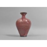 A Pink Glazed Stoneware Vase of Meiping Form, 17cm high