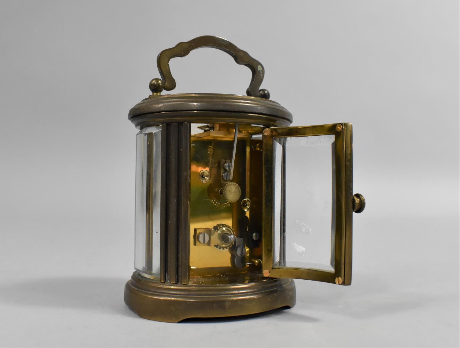 A Miniature Brass Carriage Clock of Oval Form, The White Enamelled Dial Inscribed for Matthew - Bild 2 aus 2