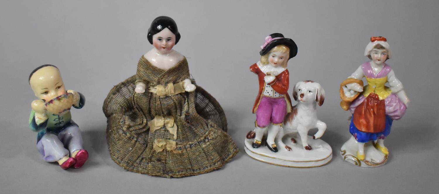 A Collection of Figural Ornaments to Include Continental and Royal Worcester Seated Chinese Child