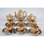 A Hand Painted Samurai Coffee Set Comprising Six Cups, Six Saucers, Coffee Pot, Cream and Sugar